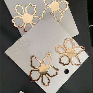 H&M Gold fashion earrings .